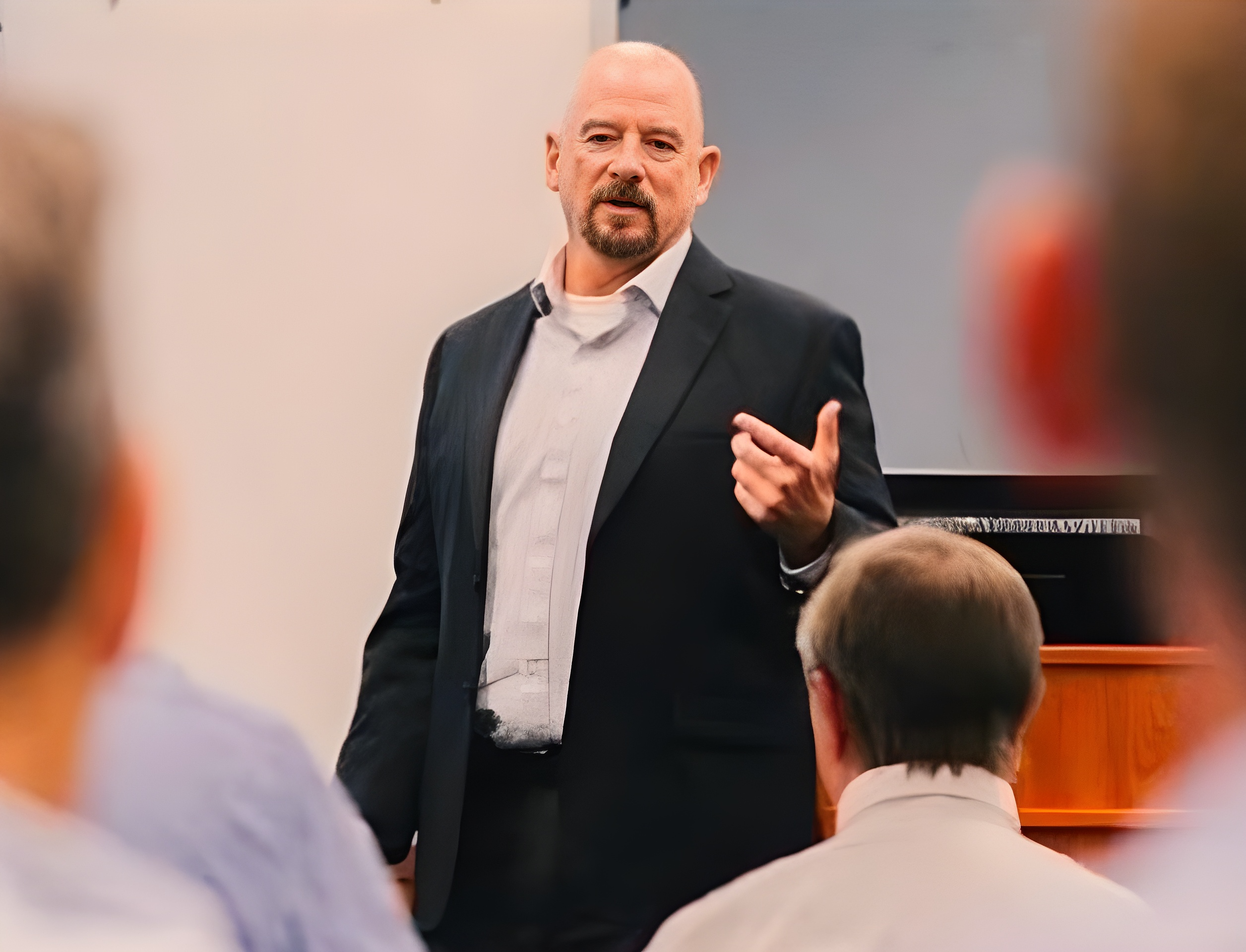 Mike Dennison speaking to a leadership audience